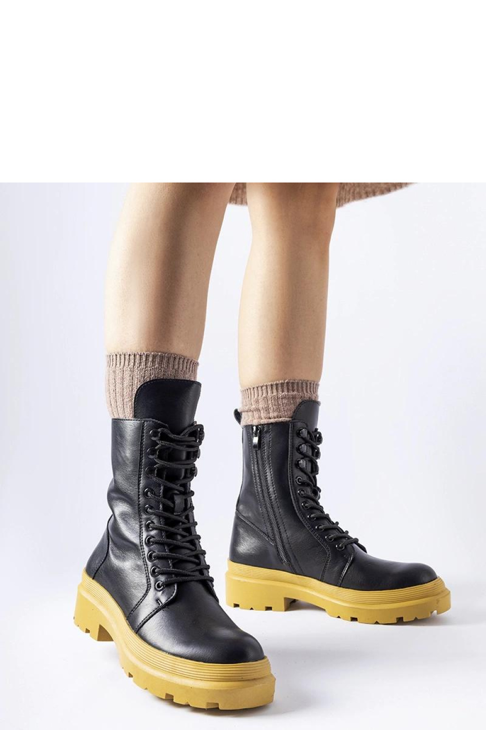 Quennie black ankle boots on a yellow sole - Solea